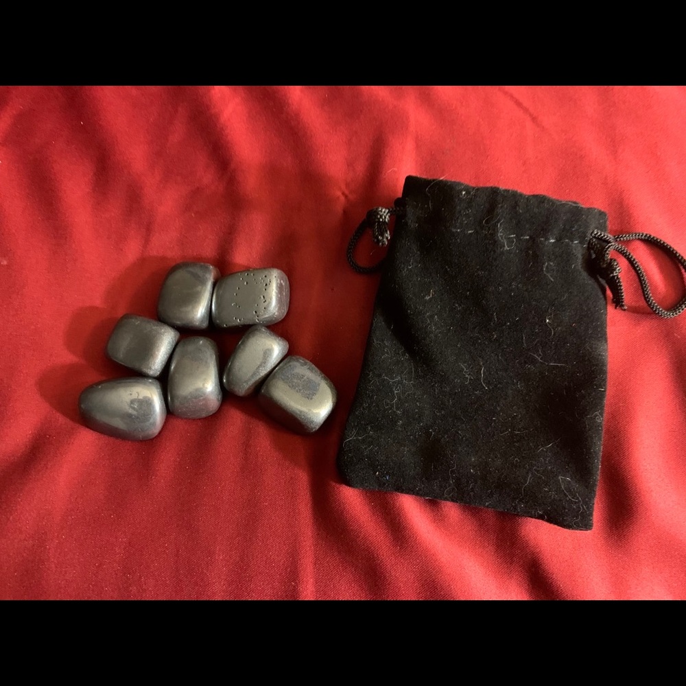 Pouch of 7 Hematite tumble stones. New